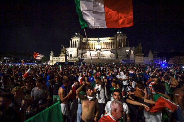 Italian fans celebrate the victory of Italy after the Euro 2020 Final match between Italy and England, played at Wembley stadium, in Rome, on on July 12, 2021. (Antonio Masiello/Getty Images)