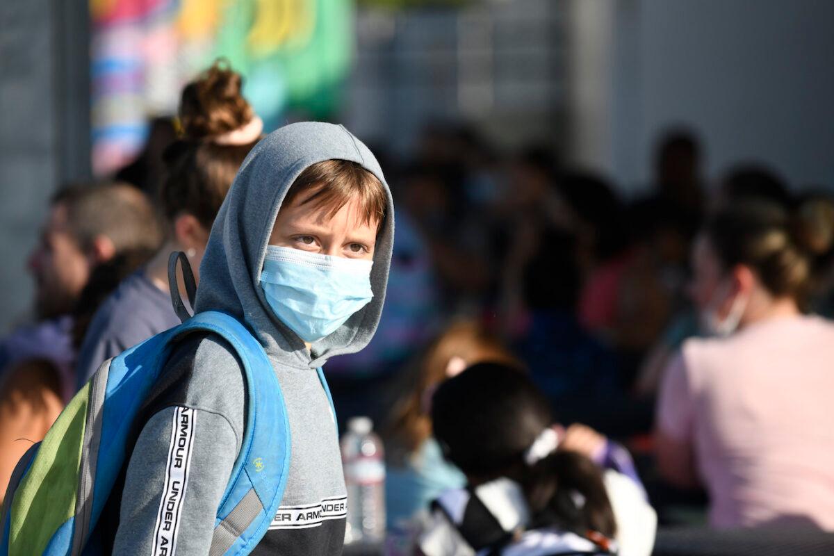 A masked student at an elementary school in Chula Vista, Calif.. on July 21, 2021. (Denis Poroy/AP Photo)