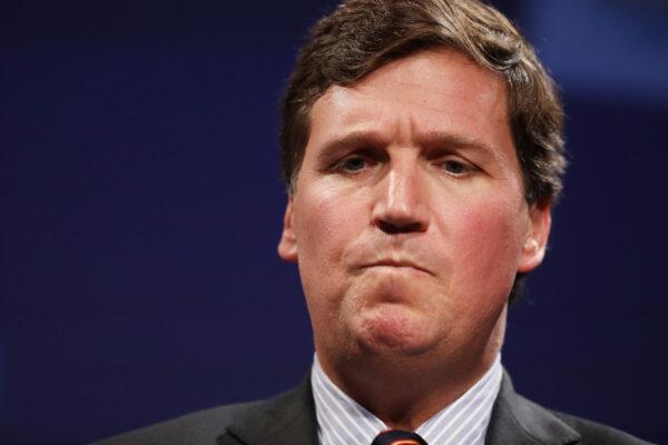 Fox News host Tucker Carlson takes part in a discussion in Washington on March 29, 2019. (Chip Somodevilla/Getty Images)