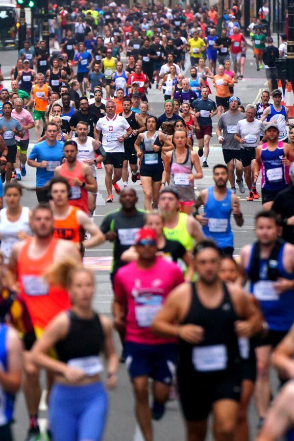 Runners on Piccadilly as they take part in the Asics London 10k in London on July 25, 2021. (Victoria Jones/PA)