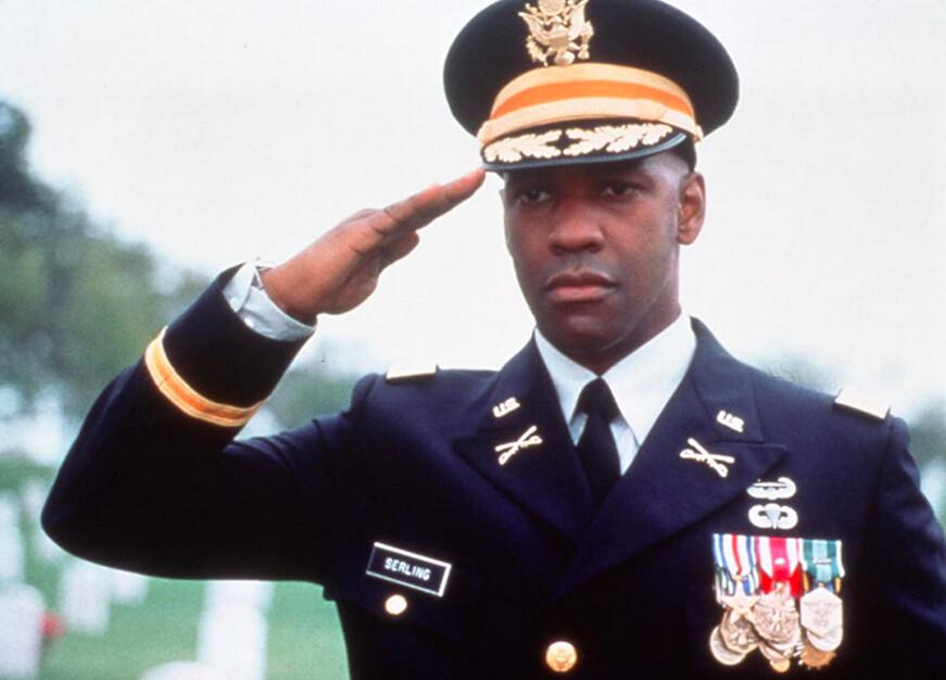 LTC Nat Serling (Denzel Washington) salutes at the grave of Captain Karen Walden, in “Courage Under Fire.” (Fox 2000 Pictures)