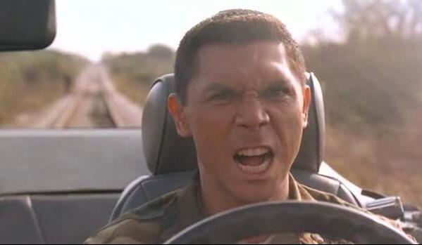 Staff Sergeant Monfriez (Lou Diamond Phillips) gets ready to meet his maker, in “Courage Under Fire.” (Fox 2000 Pictures)