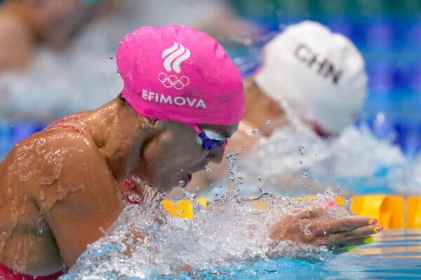 Yuliya Efimova of the Russian Olympic Committee swims in a heat during the women's 100-meter breaststroke at the 2020 Summer Olympics in Tokyo, Japan, on July 25, 2021. (Martin Meissner/AP)