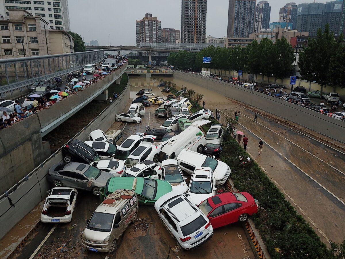 An aerial view shows cars at the entrance of a tunnel after heavy rains hit the city of Zhengzhou in China's central Henan province on July 22, 2021. (Noel Celis/AFP via Getty Images)