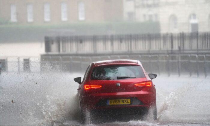 Homes, Roads, Hospitals Flooded as Storms Batter England’s South