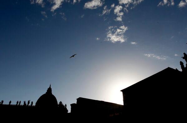 St. Peter's Basilica is silhouetted at dusk at the Vatican on June 29, 2017. (Riccardo De Luca/AP Photo)
