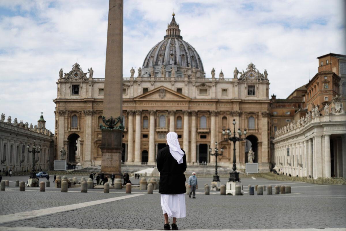 A nun stands in St. Peter's Square at the Vatican on March 21, 2021. (Gregorio Borgia/AP Photo)