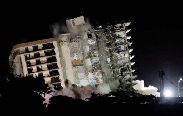 The partially collapsed Champlain Towers South residential building is demolished, in Surfside, Fla., on July 4, 2021. (Marco Bello/Reuters)