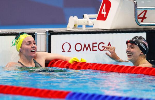 Ariarne Titmus of Team Australia and Katie Ledecky of Team United States react after competing in the Women's 400m Freestyle Final on day three of the Tokyo 2020 Olympic Games at Tokyo Aquatics Centre in Tokyo, Japan on July 26, 2021. (Maddie Meyer/Getty Images)