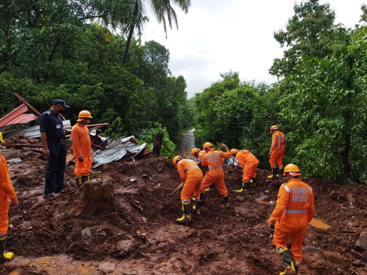 Members of National Disaster Response Force (NDRF) conduct a search and rescue operation after a landslide following heavy rains in Ratnagiri district, Maharashtra state, India, on July 25, 2021. (National Disaster Response Force/Handout via Reuters)