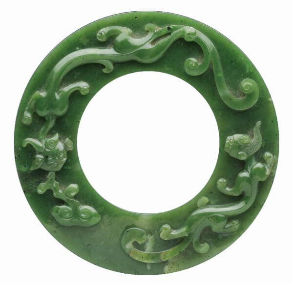 This large jade ring from the Qing Dynasty exemplifies the original style that influenced Chinese jewelry like jade bracelets for many years to come. (Courtesy of the National Palace Museum)