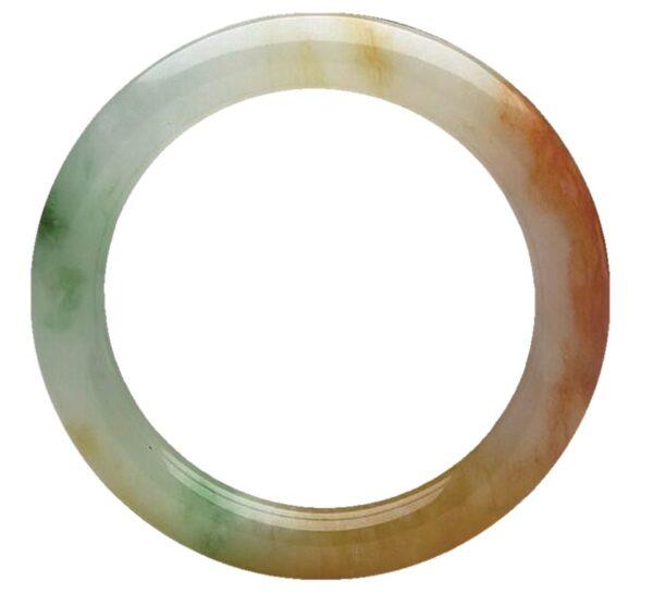 Jadeite bracelet, Qing Dynasty (1644–1911). Though Fei Cui jade comes in several colors, it is extremely rare to find three colors present in a single piece. This stunning tricolored jade bracelet symbolizes blessings, fortunes, and longevity. (Courtesy of the National Palace Museum)