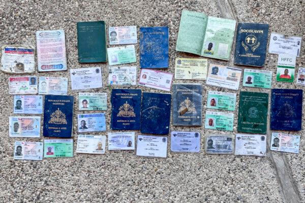 Passports, visas, and identification cards discarded by illegal immigrants about to cross the Rio Grande into the United States, in Acuna, Mexico, on July 25, 2021. (Charlotte Cuthbertson/The Epoch Times)