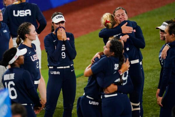 Members of team United States react after a softball game against Japan at the 2020 Summer Olympics in Yokohama, Japan, on July 27, 2021. Japan won 2–0. (Matt Slocum/AP Photo)