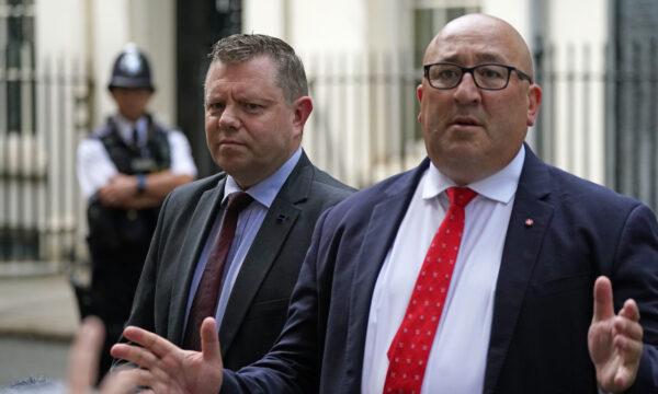 Chairman of the Police Federation John Apter (L) and Ken Marsh, chairman of the Metropolitan Police Federation speak to the media after delivering a letter to 10 Downing Street in London on July 27, 2021. (Victoria Jones/PA)