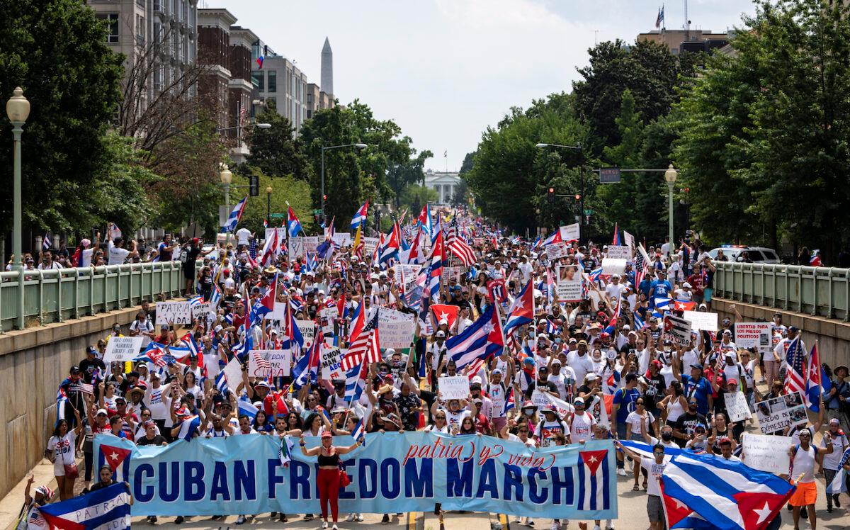 Cuban activists and supporters march from the White House to the Cuban Embassy on 16th Street during a Cuban freedom rally in Washington on July 26, 2021. (Drew Angerer/Getty Images)