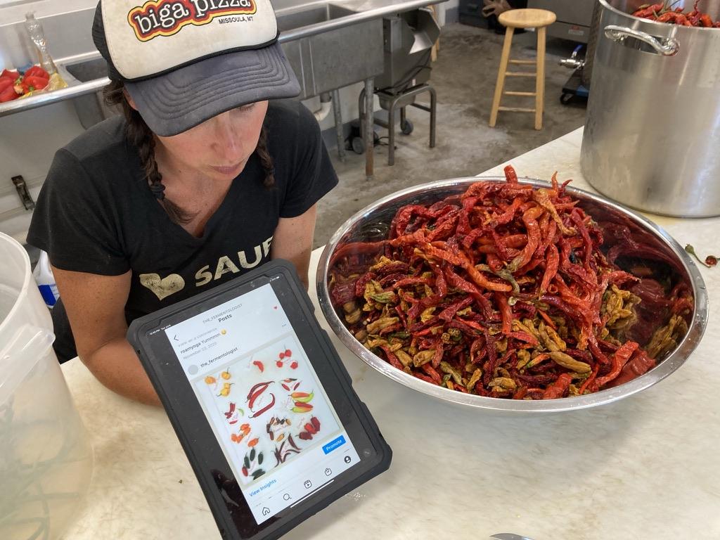 Erin Belmont divulges the proprietary mix of Mr. Sunshine peppers that go into her hot sauce. (Ari LeVaux)