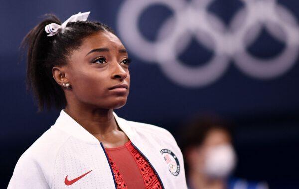 Simone Biles of the United States looks on during the artistic gymnastics women's team final during the Tokyo 2020 Olympic Games at the Ariake Gymnastics Centre in Tokyo, Japan, on July 27, 2021. (Loic Venance/AFP via Getty Images)