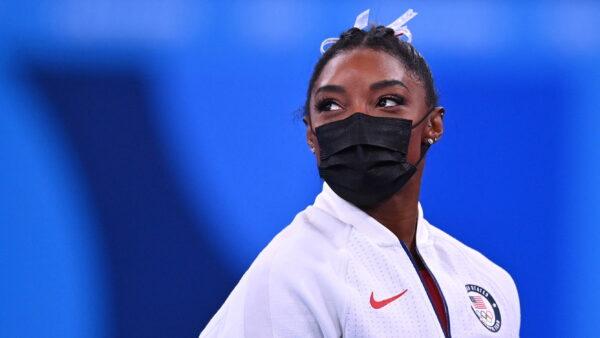 Simone Biles of the United States wearing a protective face mask looks on at the Tokyo Olympics in Tokyo, Japan on July 27. 2021. (Dylan Martine/Reuters)