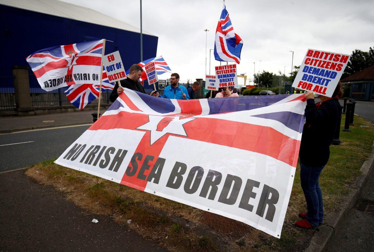 Loyalists protest against the Northern Ireland Brexit protocol at Belfast Harbour Estate, in Belfast, Northern Ireland, on Jul. 3, 2021. (Jason Cairnduff/Reuters)