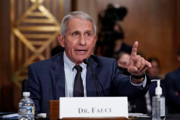 Dr. Anthony Fauci responds to accusations by Sen. Rand Paul (R-Ky.) as he testifies before the Senate Health, Education, Labor, and Pensions Committee on Capitol Hill on July 20, 2021. (J. Scott Applewhite/Getty Images)