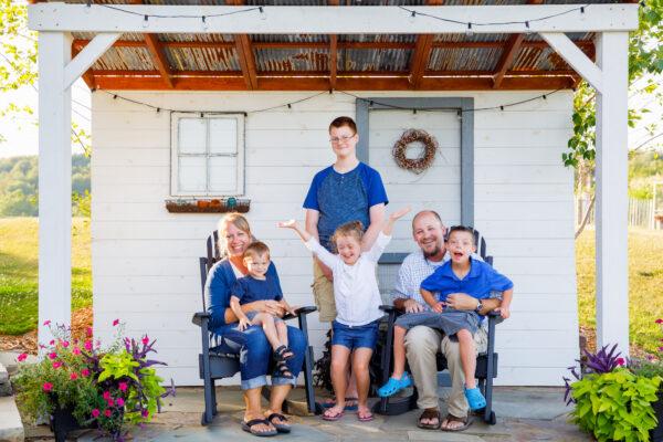 The Miller family: Lisa and Marlin (seated), and their children. (Landon Troyer/Plain Values)