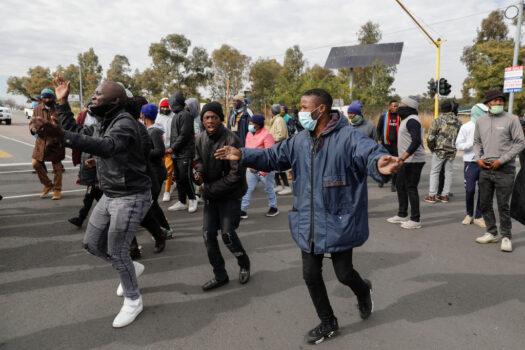 Soweto residents picket near the entrance to state entity Eskom Offices at Megawatt Park in Midrand, near Johannesburg, South Africa, on June 9, 2021, due to the ongoing electricity disruptions. (Phill Magakoe/AFP via Getty Images)
