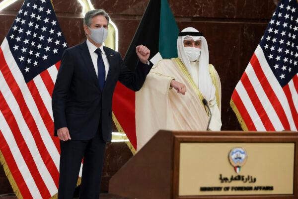 Kuwaiti Foreign Minister Sheikh Ahmad Nasser Al-Mohammad Al-Sabah (R) and U.S. Secretary of State Antony Blinken(L) arrive for a joint news conference at the Ministry of Foreign Affairs in Kuwait City, Kuwait, on July 29, 2021. (Jonathan Ernst/Pool via AP)