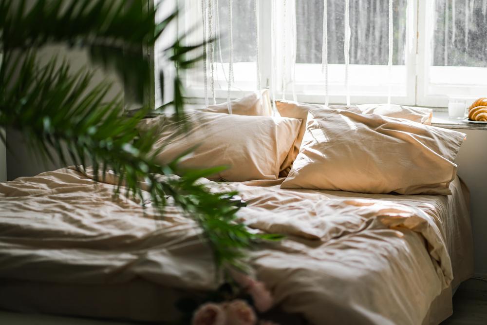 Bringing your own pillow and fresh sheets might help you feel more relaxed and comfortable. (Irine and Andrew/Shutterstock)