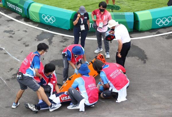 Connor Fields of the United States receives medical attention at the Ariake Urban Sports Park, Tokyo, on July 30, 2021. (Matthew Childs/Reuters)