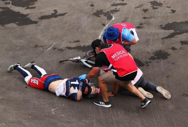 Connor Fields of Team United States receives medical treatment after a crash during the Men's BMX semifinal heat 1, run 3 on day seven of the Tokyo 2020 Olympic Games at Ariake Urban Sports Park in Tokyo, Japan on July 30, 2021. (Francois Nel/Getty Images)
