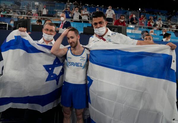 Artem Dolgopyat of Israel, celebrates after winning the gold medal on the floor exercise during the artistic gymnastics men's apparatus final at the 2020 Summer Olympics, in Tokyo on Aug. 1, 2021. (Natacha Pisarenko/AP)