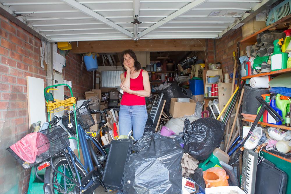 It's time to get a garbage bag and a donations box and tackle the task of organizing and cleaning out your garage. (NorthAllertonMan/Shutterstock)