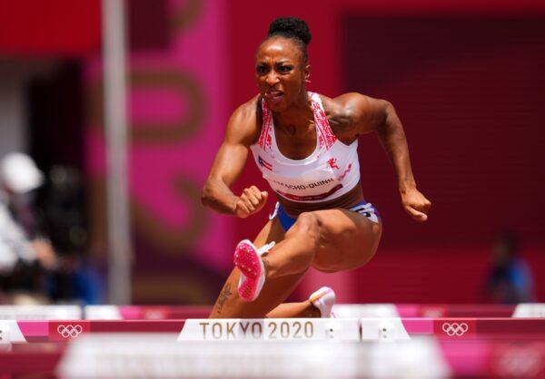 Jasmine Camacho-Quinn of Puerto Rico is in action during the women's 100m hurdles at Olympic Stadium in Tokyo, Japan, on Aug. 2, 2021. (Aleksandra Szmigiel/Reuters)
