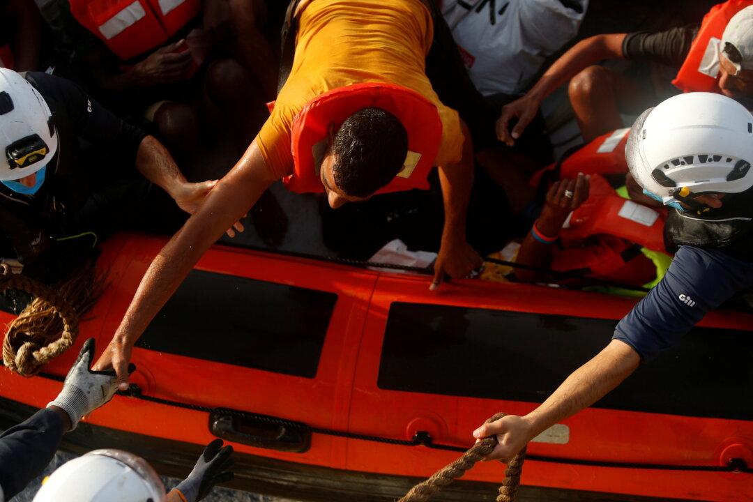 Rescuers Pull 394 Migrants From Dangerously Overcrowded Boat Off Tunisia