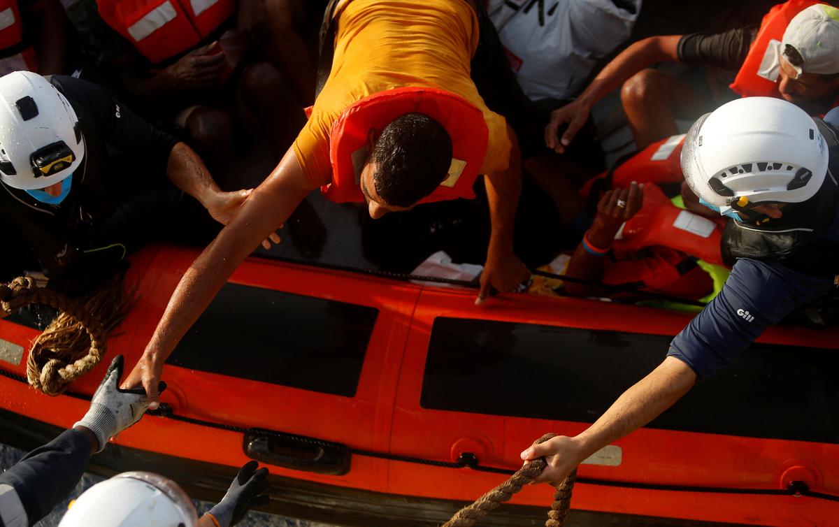 Rescuers Pull 394 Migrants From Dangerously Overcrowded Boat Off Tunisia