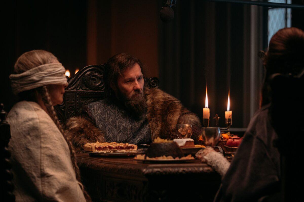 The Lord (Joel Edgerton, C) in "The Green Knight." (A24)