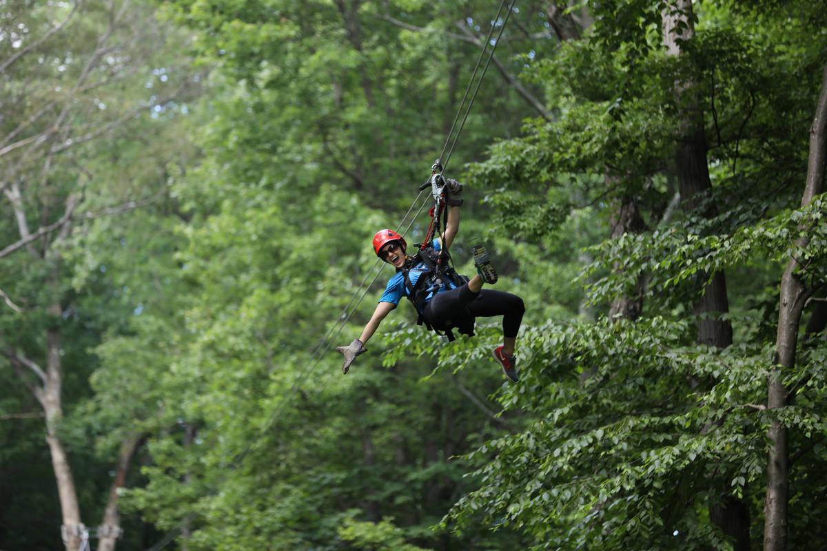 The exhilaration of floating through the air on the Screaming Hawk Zipline at Seven Springs. (Courtesy of Seven Springs)