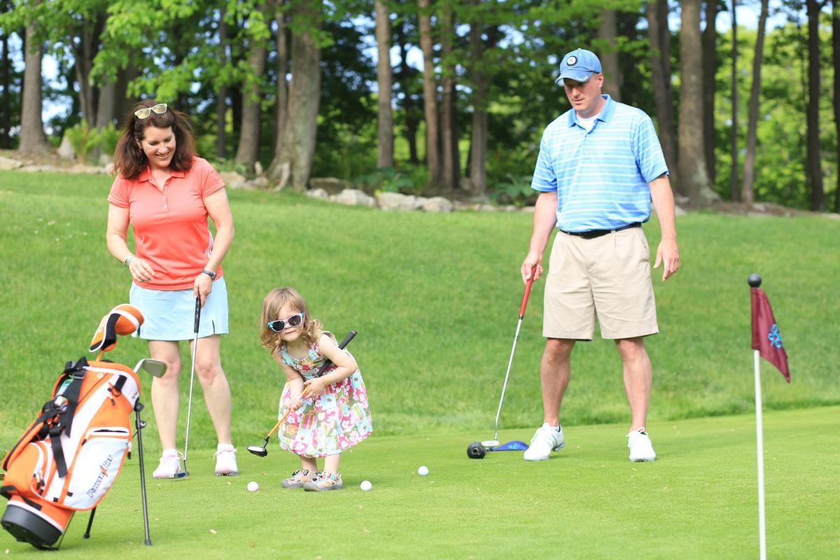 A couple introduces their daughter to golf at a young age at Seven Springs Mountain Resort (Courtesy of Seven Springs)