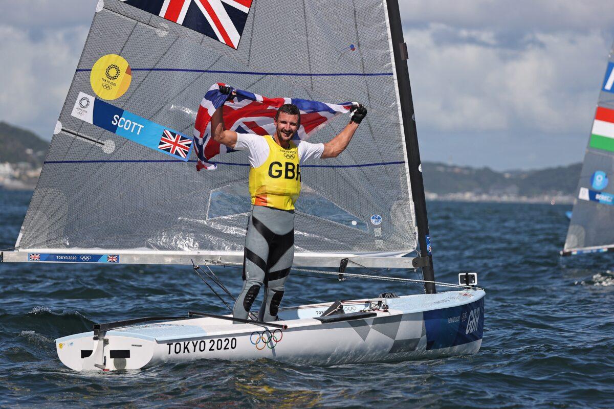 Giles Scott of Britain celebrates after competing men's Finn medal race at Tokyo 2020 Olympic Games, Tokyo, on Aug. 3, 2021. (Carlos Barria/Reuters)
