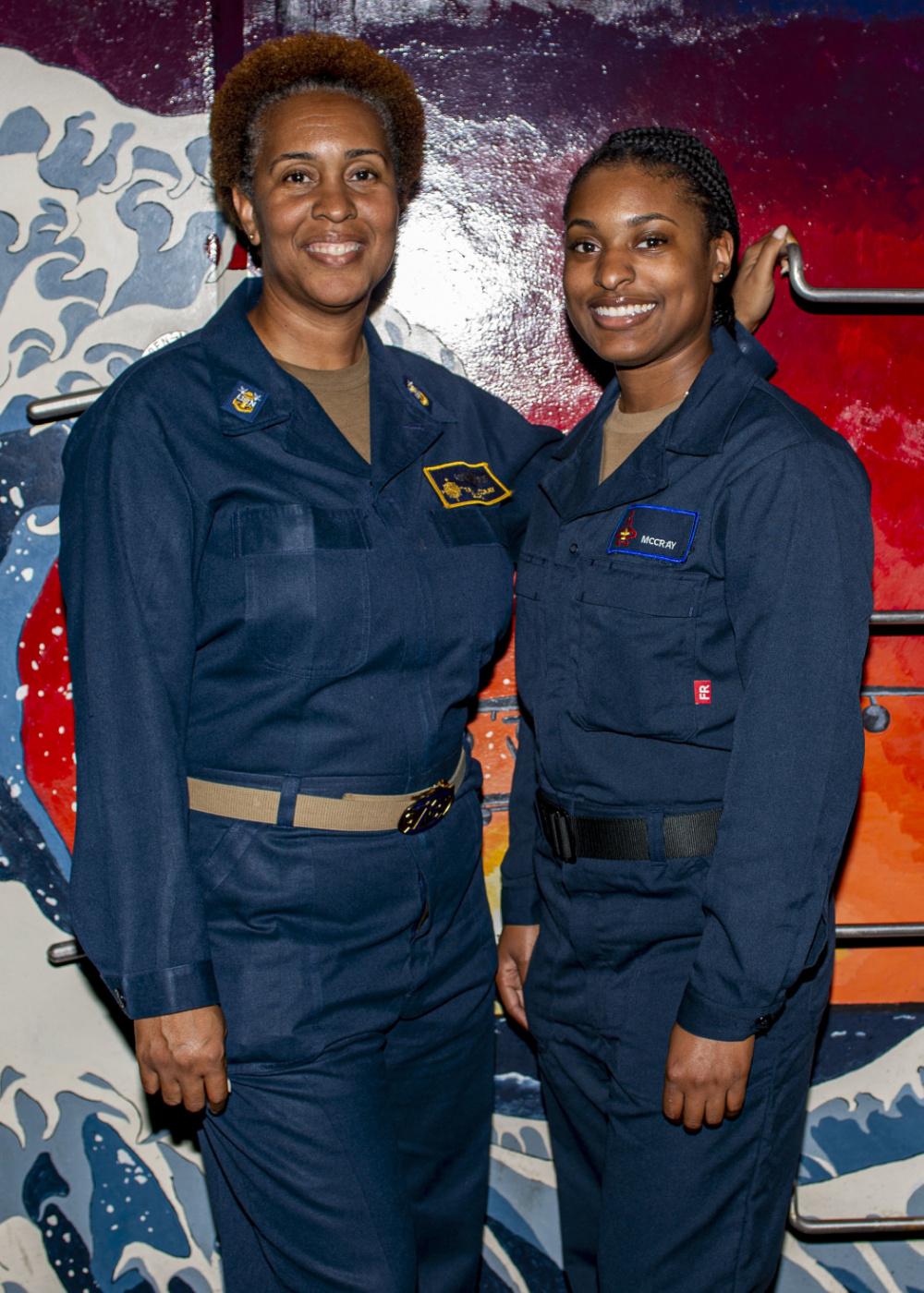 LSSN Racquel McCray (R) says she knew from the age of 18 that she wanted to join the Navy. (Courtesy of Gary Prill via <a href="https://www.dvidshub.net/news/401323/big-boots-fill">DVIDSHUB</a>)