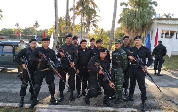 Cuban special forces, called the Black Berets, pose alongside their Chinese trainers from a paramilitary in a government-run training school in Cuba in an undated photo. (Courtesy of ADN Cuba)