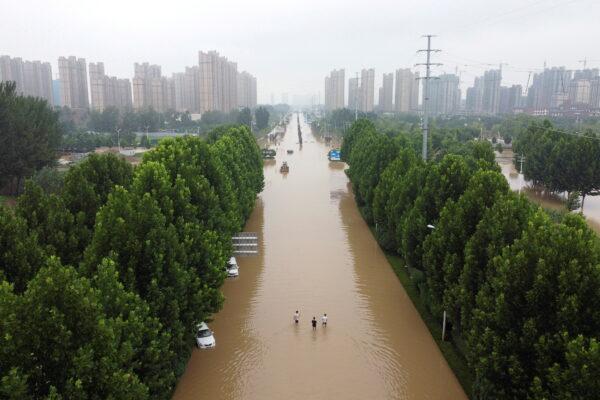 An aerial view shows a flooded road following heavy rainfall in Zhengzhou, Henan Province, China, on July 23, 2021. (Aly Song/File Photo/Reuters)