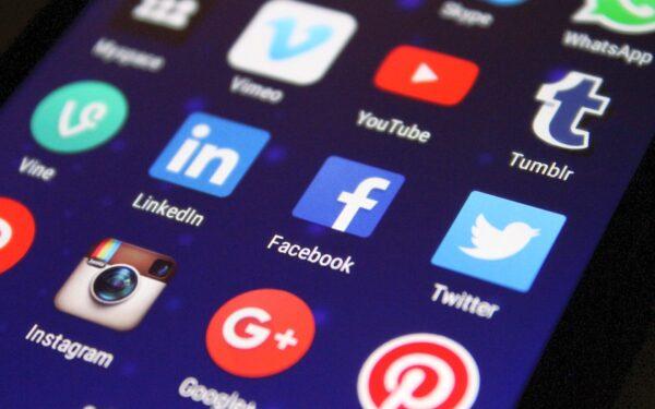 Logos for social media apps are shown on a cell phone screen. (Pixelkult/Pixabay)