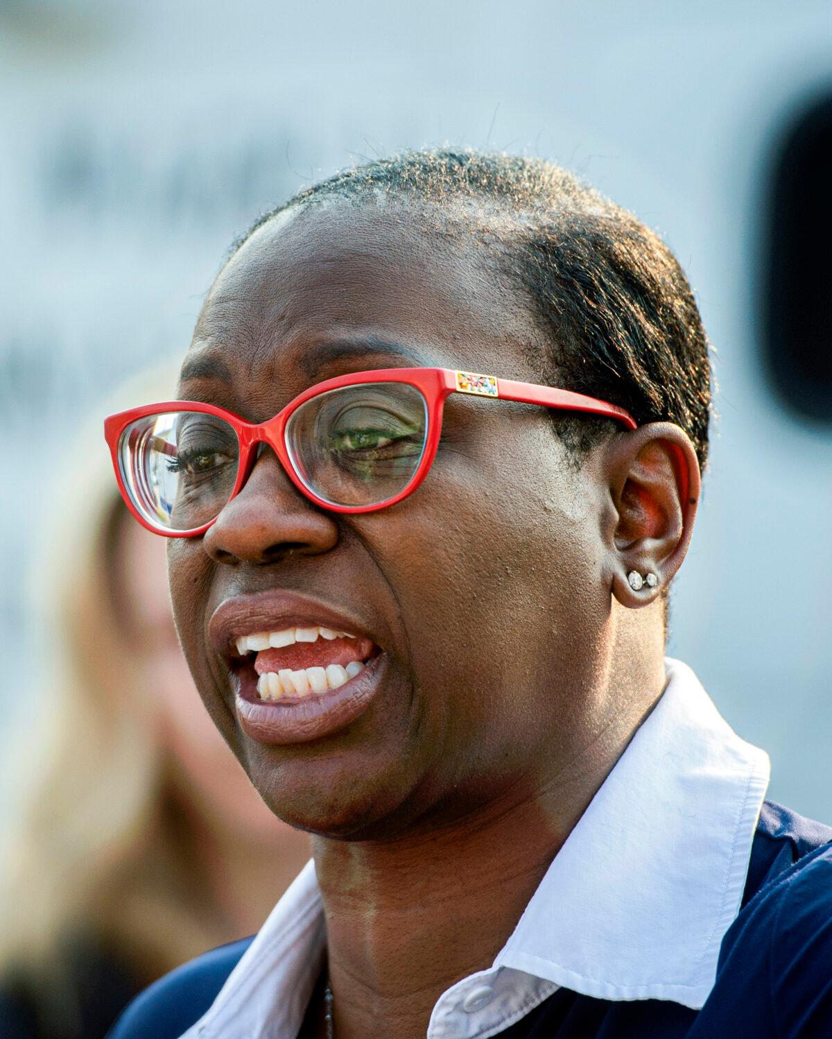Nina Turner, a candidate running in a special Democratic primary election for Ohio's 11th Congressional District speaks with supporters near the Cuyahoga County Board of Elections before casting her vote in Cleveland, Ohio, on July 7, 2021. (Phil Long/AP Photo)