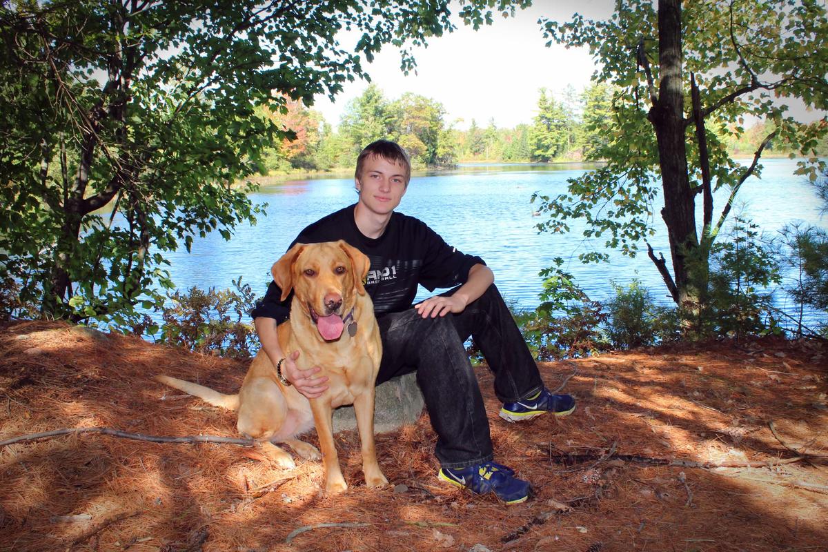 Ben with his dog, Maggie. (Courtesy of Ann Brigham Chrudinsky)