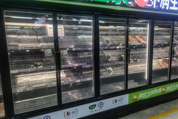 Empty shelves at a supermarket in Wuhan, as people stock up on items, in China's central Hubei Province, on Aug. 2, 2021. (STR/AFP via Getty Images)