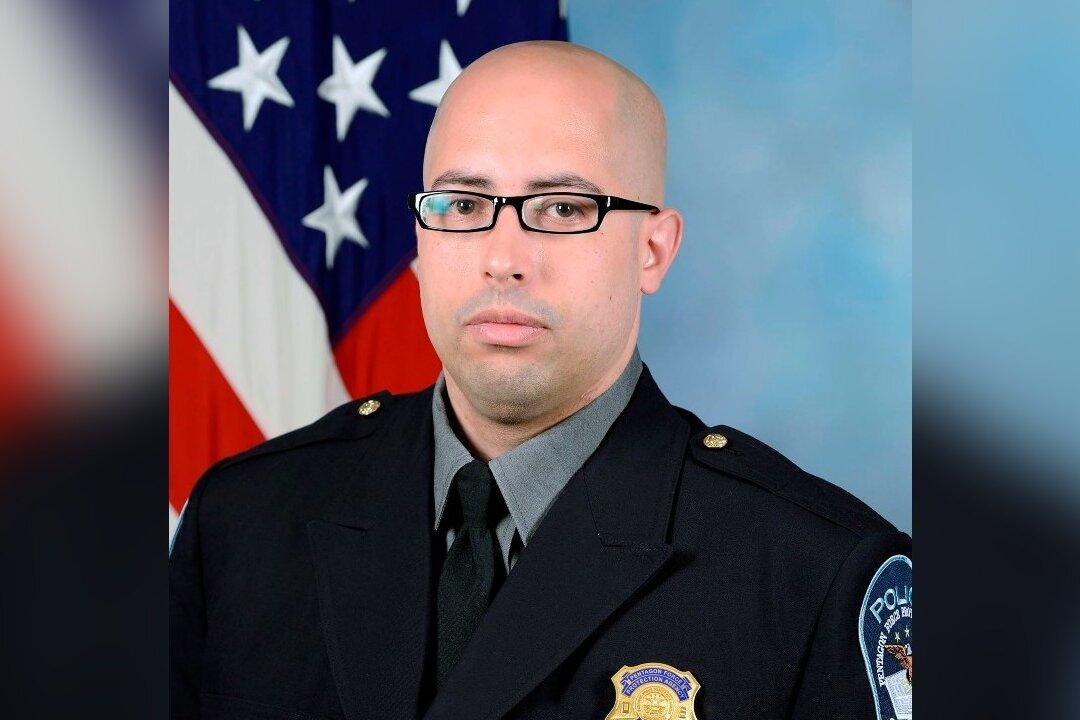 Pentagon Identifies Officer Slain in Attack as Officials Seek Clues