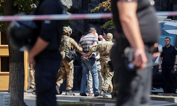 Ukrainian Police Detain Man Who Threatened to Detonate Grenade in Government Building