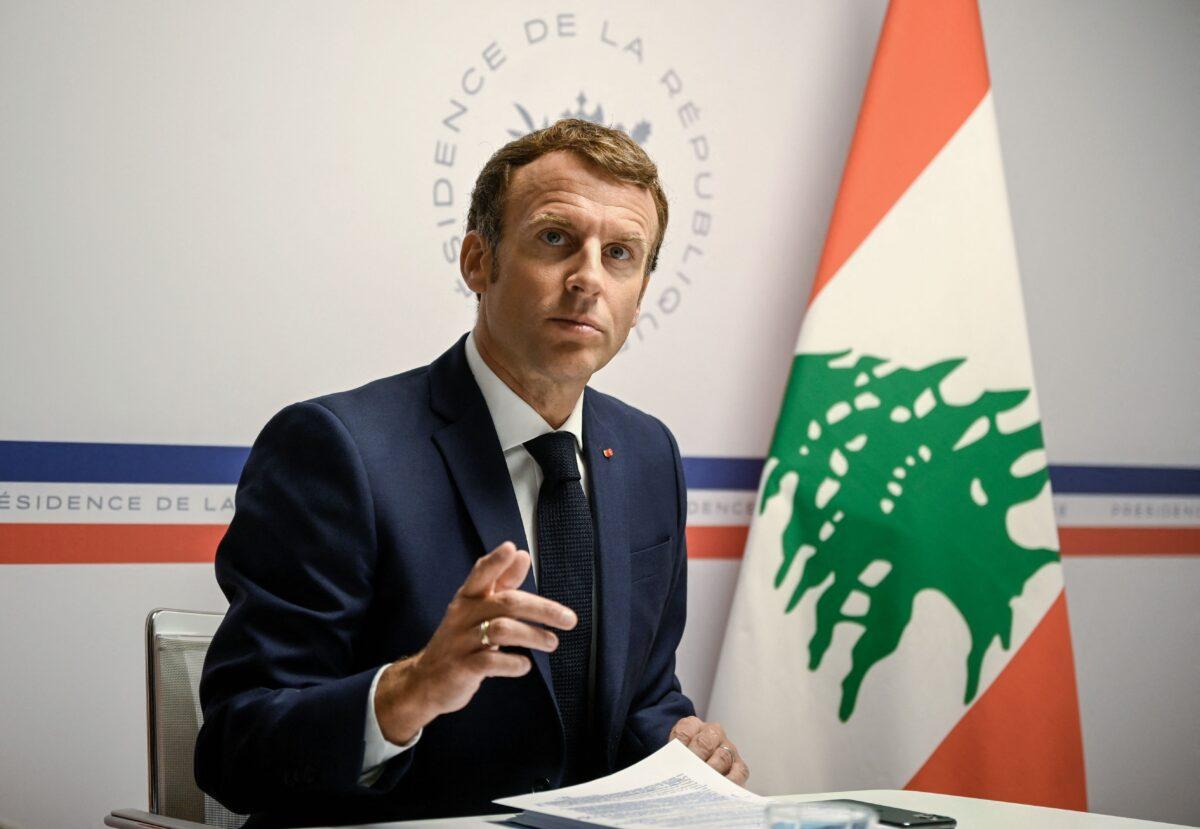 French President Emmanuel Macron gestures during an online gathering in Bormes-Les-Mimosas, France, on Aug. 4, 2021. (Christophe Simon/AFP via Getty Images)